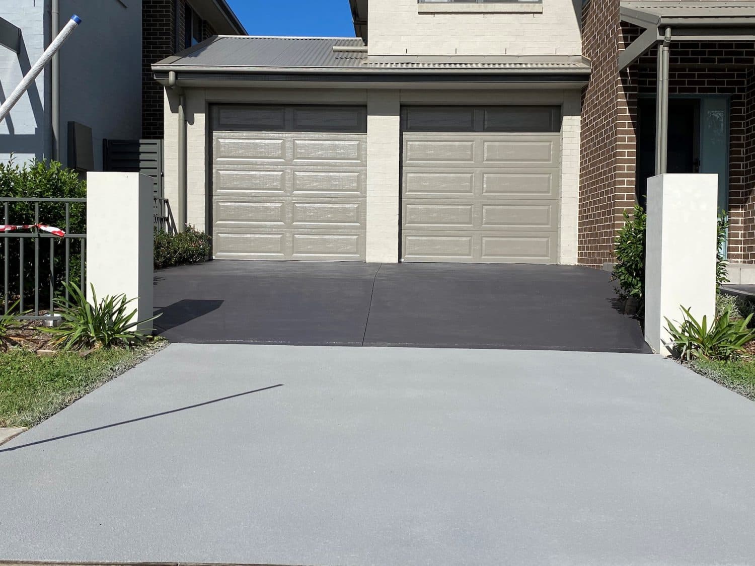 Concrete resurfacing in Flint with Colorseal in Charcoal, driveway resurfacing at a home in North Richmond, Sydney