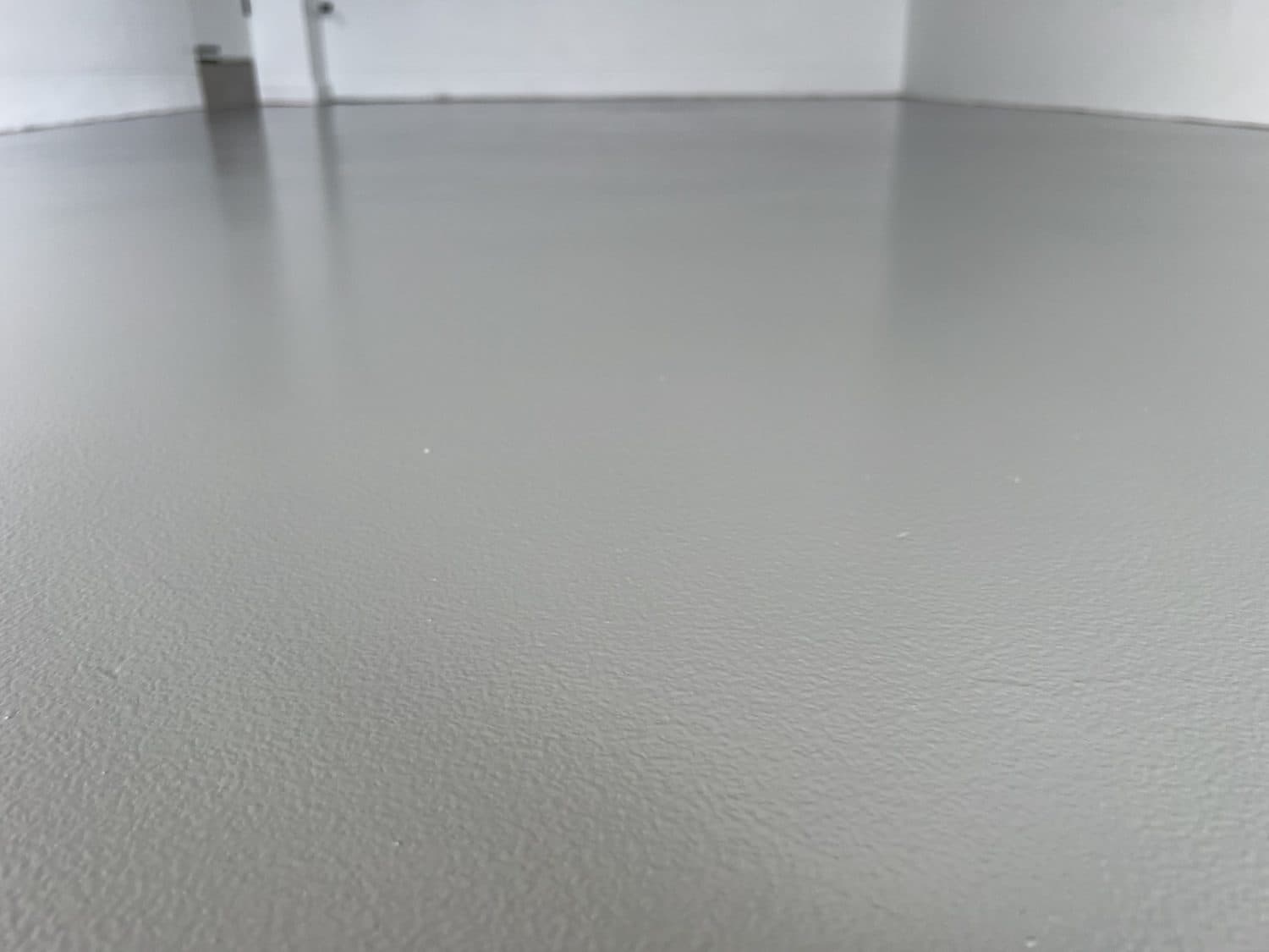 Epoxy roll coat in Dusty grey, garage floor at a home in Belmore, Sydney