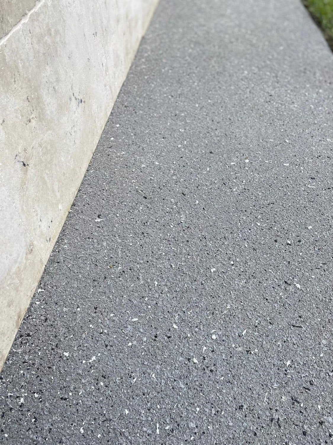 Steel grey resurfaced concrete at Berala, laid over a repaired and prepared slab